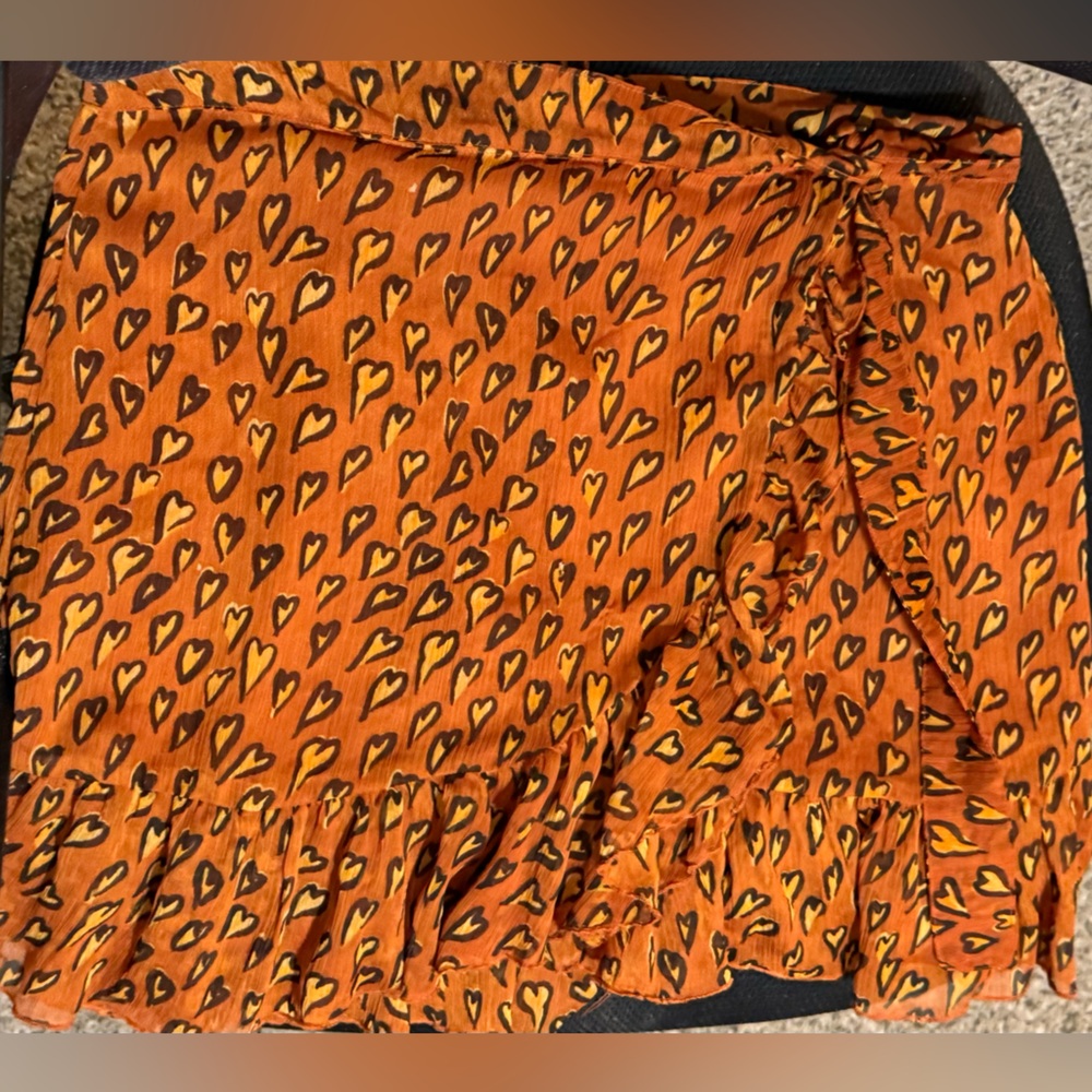 Urban Outfitters Orange Ruffled Mini Skirt with Heart Print